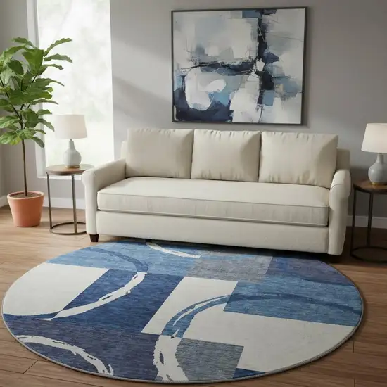 8' Blue And Ivory Geometric Washable Round Rug With UV Protection Photo 2