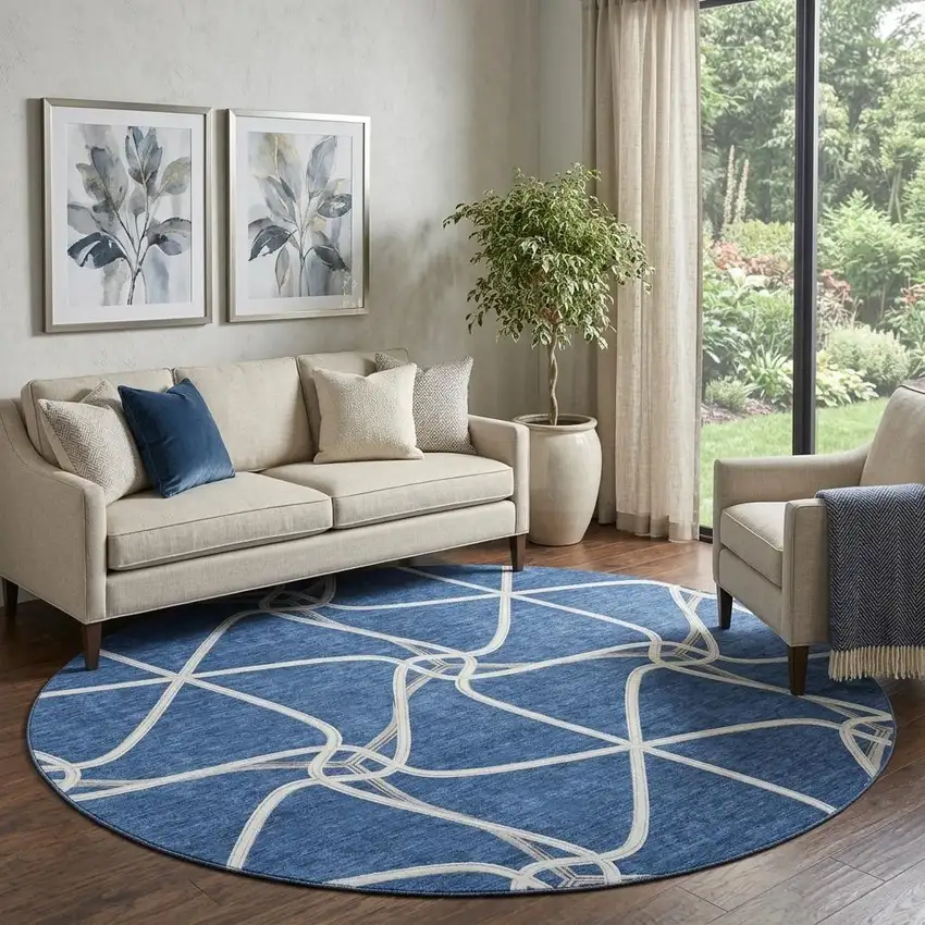 8' Blue And Ivory Geometric Washable Round Rug With UV Protection Photo 1