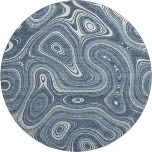 Photo of 8' Blue And Ivory Geometric Washable Round Rug With UV Protection