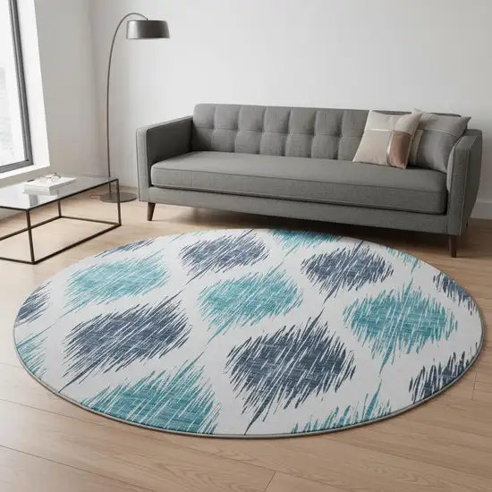8' Blue And Ivory Ikat Washable Round Rug With UV Protection Photo 2