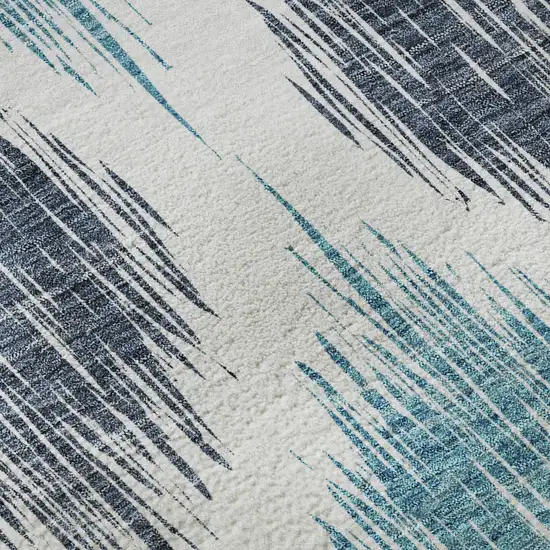 8' Blue And Ivory Ikat Washable Round Rug With UV Protection Photo 9