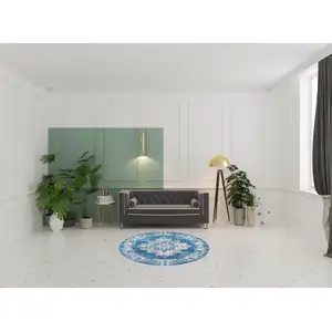 Photo of 5' Blue And Ivory Medallion Distressed Round Rug
