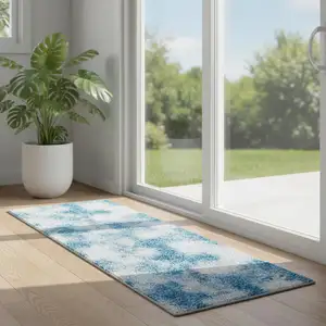 Photo of 6' Blue And Ivory Medallion Distressed Runner Rug