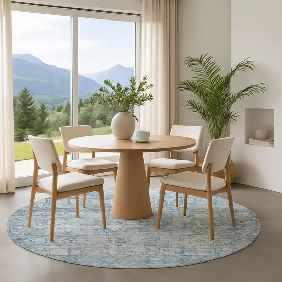 8' Blue And Ivory Oriental Washable Round Rug With UV Protection Photo 4