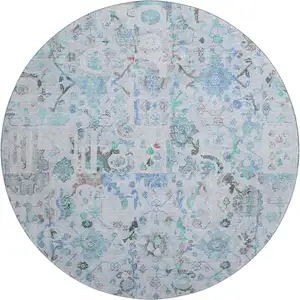 Photo of 8' Blue And Ivory Patchwork Washable Round Rug With UV Protection