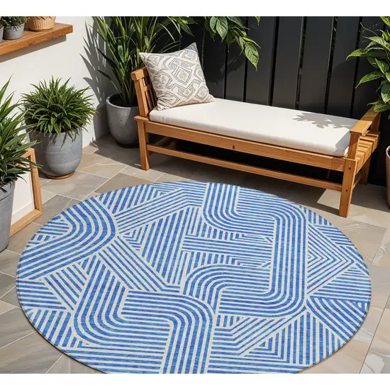 8' Blue And Ivory Round Abstract Washable Indoor Outdoor Area Rug Photo 1