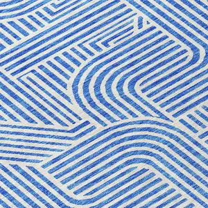 Photo of 8' Blue And Ivory Round Abstract Washable Indoor Outdoor Area Rug