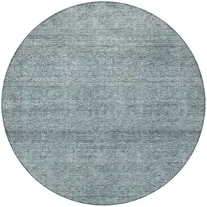 Photo of 8' Blue And Ivory Round Abstract Washable Indoor Outdoor Area Rug
