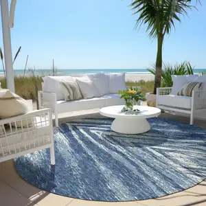 Photo of 8' Blue And Ivory Round Abstract Washable Indoor Outdoor Area Rug