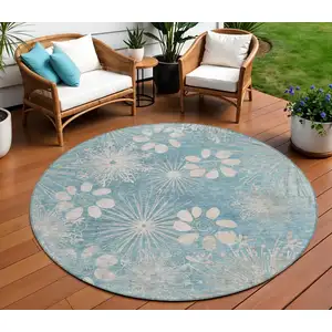 Photo of 8' Blue And Ivory Round Floral Washable Indoor Outdoor Area Rug