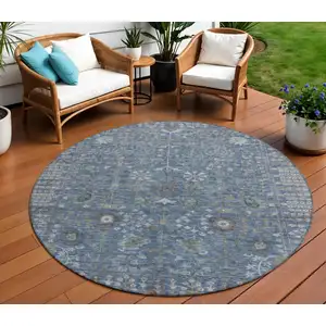 Photo of 8' Blue And Ivory Round Floral Washable Indoor Outdoor Area Rug