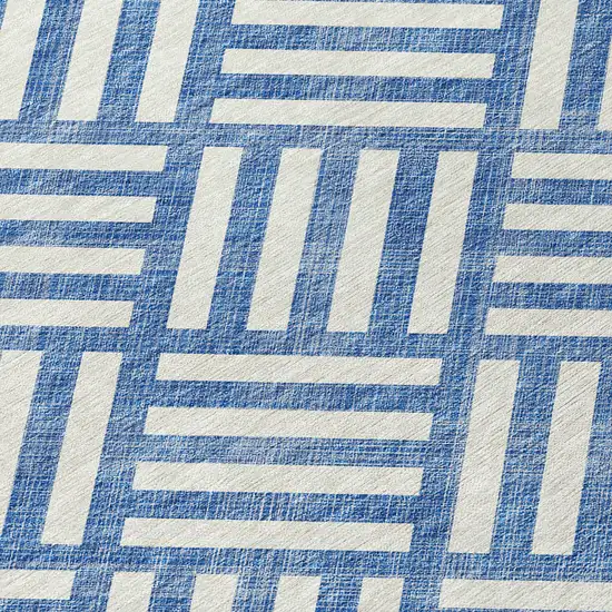 8' Blue And Ivory Round Geometric Washable Indoor Outdoor Area Rug Photo 4