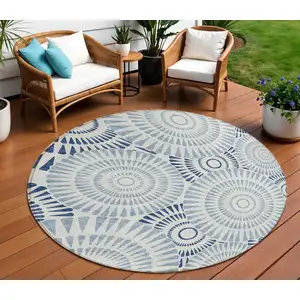Photo of 8' Blue And Ivory Round Geometric Washable Indoor Outdoor Area Rug