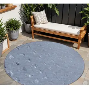 Photo of 8' Blue And Ivory Round Geometric Washable Indoor Outdoor Area Rug