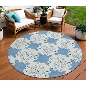 Photo of 8' Blue And Ivory Round Quatrefoil Washable Indoor Outdoor Area Rug
