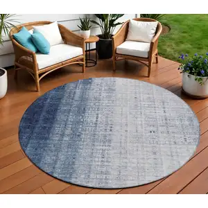 Photo of 8' Blue And Ivory Round Striped Washable Indoor Outdoor Area Rug