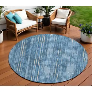 Photo of 8' Blue And Ivory Round Striped Washable Indoor Outdoor Area Rug