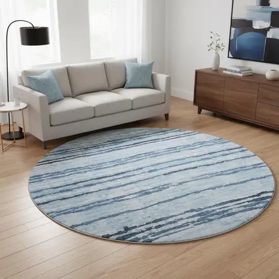 8' Blue And Ivory Striped Washable Round Rug With UV Protection Photo 1