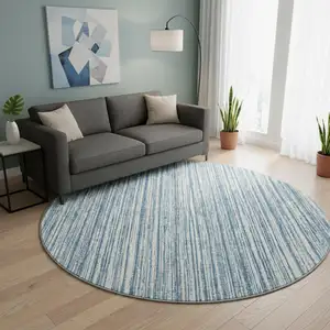 Photo of 8' Blue And Ivory Striped Washable Round Rug With UV Protection