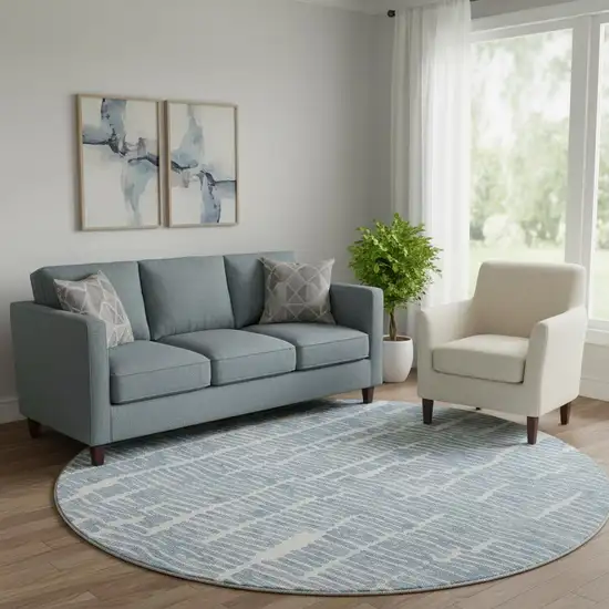 8' Blue And Ivory Vermicular Washable Round Rug With UV Protection Photo 1