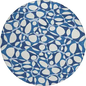 Photo of 8' Blue And Navy Blue Round Abstract Washable Indoor Outdoor Area Rug