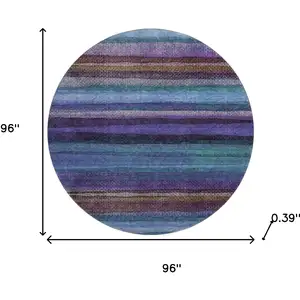 Photo of 8' Blue And Purple Striped Washable Round Rug With UV Protection