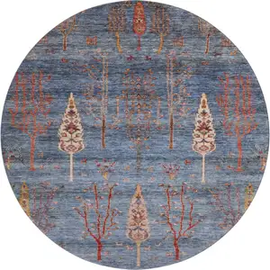 Photo of 8' Blue And Rust Floral Washable Round Rug With UV Protection
