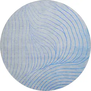 Photo of 8' Blue And Silver Abstract Washable Round Rug With UV Protection