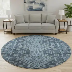 Photo of 8' Blue And Sky Blue Geometric Washable Round Rug With UV Protection
