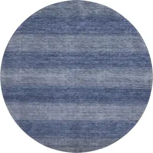 Photo of 8' Blue And Sky Blue Striped Washable Round Rug With UV Protection