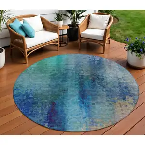 Photo of 8' Blue And Tan Round Abstract Washable Indoor Outdoor Area Rug