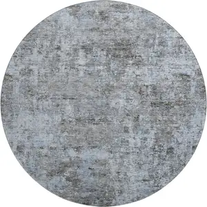 Photo of 8' Blue And Taupe Abstract Washable Round Rug With UV Protection