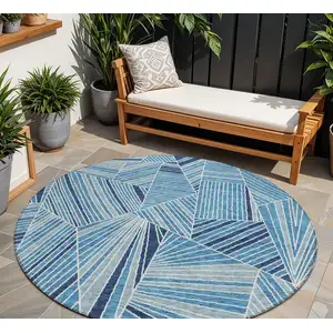 Photo of 8' Blue And Teal Blue Round Geometric Washable Indoor Outdoor Area Rug