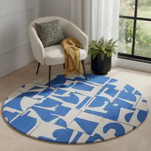 Photo of 5' Blue And White Geometric Washable Round Rug
