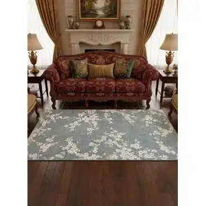 Photo of 8' Blue And White Oriental Washable Round Rug With UV Protection