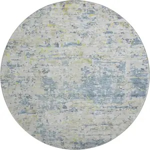 Photo of 8' Blue Beige And Gold Abstract Washable Round Rug With UV Protection