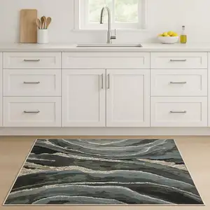 Photo of 8' Blue Black And Beige Abstract Runner Rug With Fringe