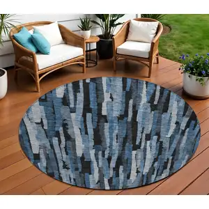 Photo of 8' Blue Black And Gray Round Striped Washable Indoor Outdoor Area Rug