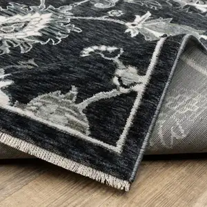 Photo of 8' Blue Black And Ivory Floral Runner Rug With Fringe