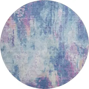 Photo of 8' Blue Blush And Ivory Abstract Washable Round Rug With UV Protection