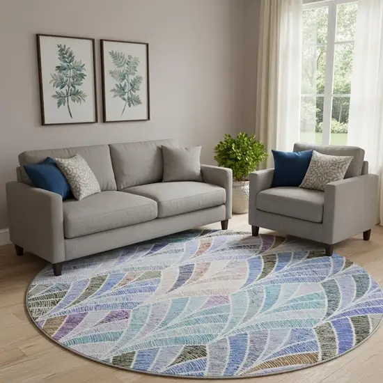 8' Blue Brown And Blush Geometric Washable Round Rug With UV Protection Photo 1