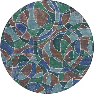 Photo of 8' Blue Brown And Emerald Round Geometric Washable Indoor Outdoor Area Rug