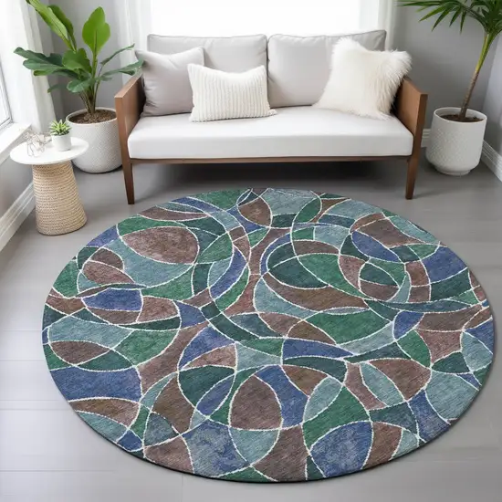 8' Blue Brown And Emerald Round Geometric Washable Indoor Outdoor Area Rug Photo 7