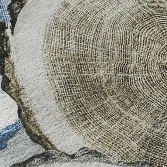 8' Blue Brown And Ivory Woodland Lodge Washable Round Rug With UV Protection Photo 9