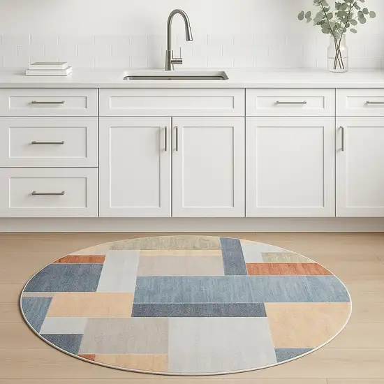 4' Blue Brown And Tan Geometric Round Rug Photo 1