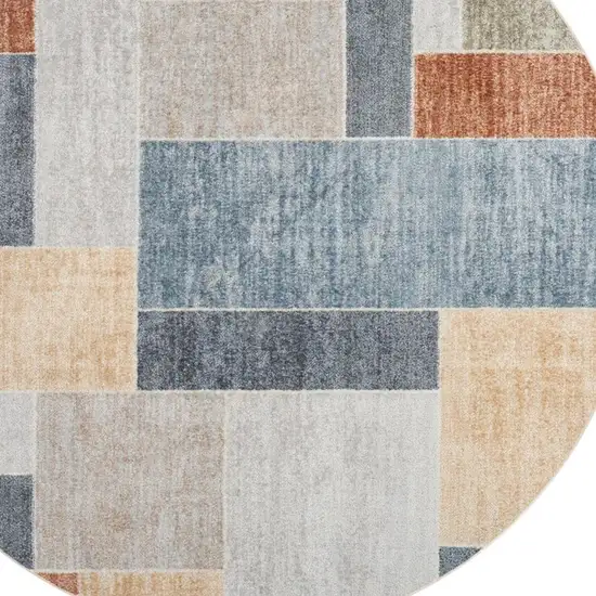 5' Blue Brown And Tan Geometric Round Rug Photo 4