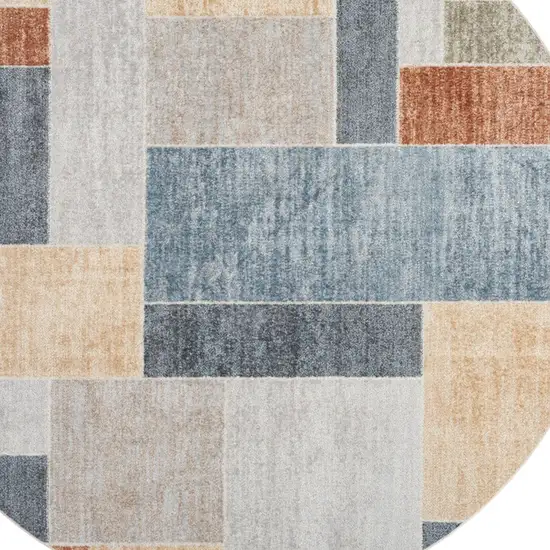 5' Blue Brown And Tan Geometric Round Rug Photo 7