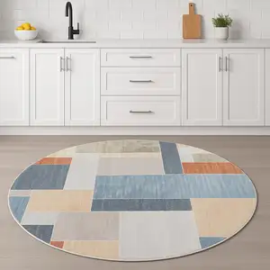 Photo of 5' Blue Brown And Tan Geometric Round Rug