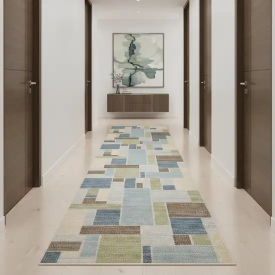 10' Blue Brown And Tan Geometric Washable Runner Rug Photo 1