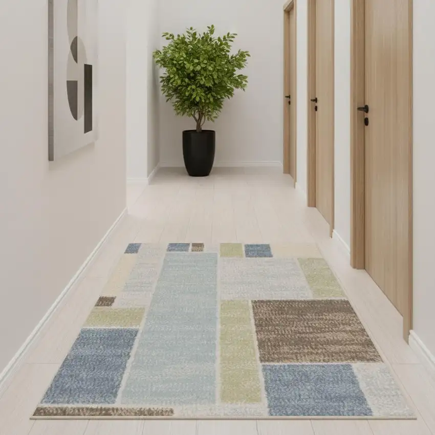 10' Blue Brown And Tan Geometric Washable Runner Rug Photo 1